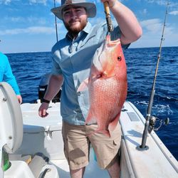 Destin Inshore Fishing Company - Angler holding a red snapper fish on the charter boat Black Label in Destin, FL!