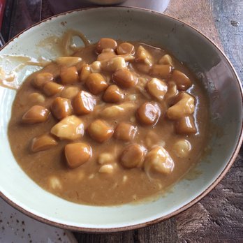 Industria Pizzeria + Bar - Gnocci poutine - Bars Near Me - Anjou, Quebec