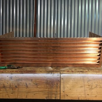 Rainman Heating & Sheet Metal - Custom copper louvre cover for a wine cellar - Heating & Air Conditioning/HVAC Near Me - Monterey, California Rainman Heating & Sheet Metal - Custom copper louvre cover for a wine cellar - Heating & Air Conditioning/HVAC Near Me - Monterey, California