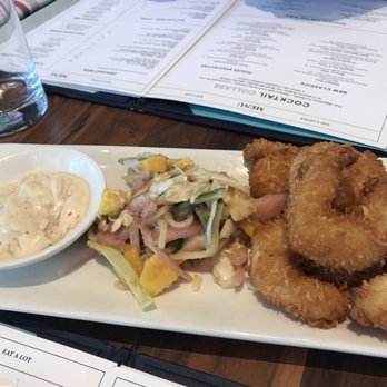Earls Kitchen + Bar - Coconut shrimp - New American Near Me - Orlando, Florida Earls Kitchen + Bar - Coconut shrimp - New American Near Me - Orlando, Florida