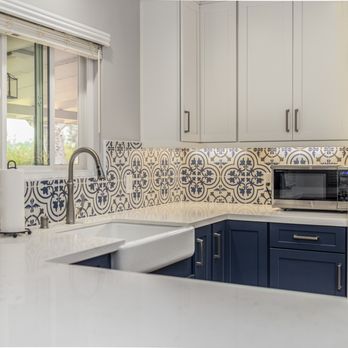 Classic Home Improvements - This Escondido kitchen features a beautiful encaustic tile backsplash to tie in the dual-toned cabinets. - General Contractors Near Me - Escondido, California Classic Home Improvements - This Escondido kitchen features a beautiful encaustic tile backsplash to tie in the dual-toned cabinets. - General Contractors Near Me - Escondido, California