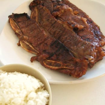 Seoul To Go - Kal Bi which is beef short ribs, thin sliced, marinated, and cooked on the grill. - Korean Near Me - Killeen, Texas Seoul To Go - Kal Bi which is beef short ribs, thin sliced, marinated, and cooked on the grill. - Korean Near Me - Killeen, Texas