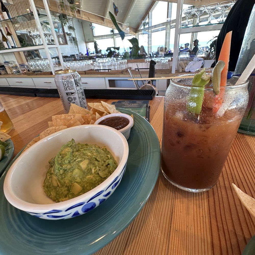 Crema - Closer view of my favorite drink alongside guac and chips - Breakfast & Brunch Near Me - Pacific Grove, California