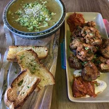 Nourish Bistro - Warm broccoli cream soup! With the amazing tempura broccoli! - Vegan Near Me - Banff, Alberta Nourish Bistro - Warm broccoli cream soup! With the amazing tempura broccoli! - Vegan Near Me - Banff, Alberta