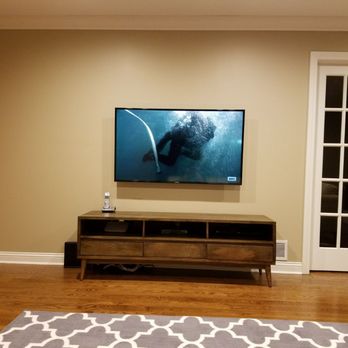 Rios Remodeling - TV mounted to wall with neat hidden wire - General Contractors Near Me - Carol Stream, Illinois