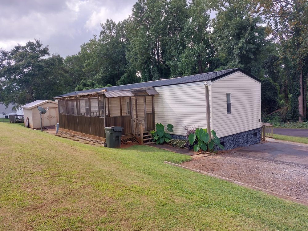 Slide of Tiger Upstate Roofing