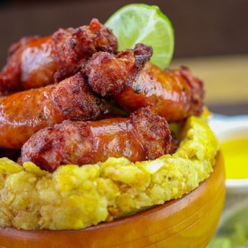 Chimiking Restaurant - Whisperlakes - Squeeze a lemon in our fried sausage you'll thank us later. - Latin American Near Me - Orlando, Florida Chimiking Restaurant - Whisperlakes - Squeeze a lemon in our fried sausage you'll thank us later. - Latin American Near Me - Orlando, Florida