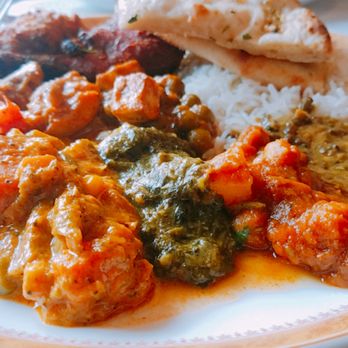 India Pavilion - Assortment of curry and meat with naan and basmati rice - Indian Near Me - Cambridge, Massachusetts