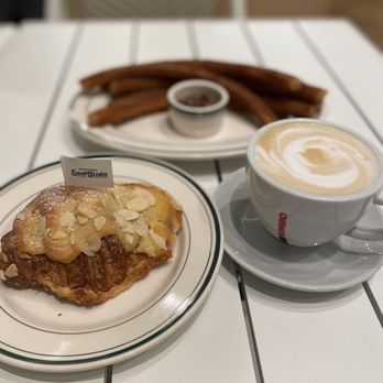 San Gines Beach - Churros, Nutella dip, almond croissant, and a cappuccino - Coffee Roasteries Near Me - Miami Beach, Florida San Gines Beach - Churros, Nutella dip, almond croissant, and a cappuccino - Coffee Roasteries Near Me - Miami Beach, Florida