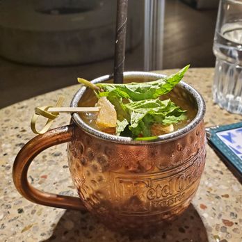 Deck. - KIND KANE (Mule) $17 Ketel One, papaya shrub, ginger shrub,  lime juice, ginger beer. - Hawaiian Near Me - Honolulu, Hawaii