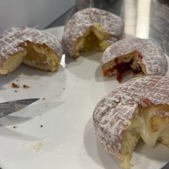 Donut Palace - Fillings left to right- Apple, lemon, red berry and cream - Donuts Near Me - Portland, Oregon Donut Palace - Fillings left to right- Apple, lemon, red berry and cream - Donuts Near Me - Portland, Oregon
