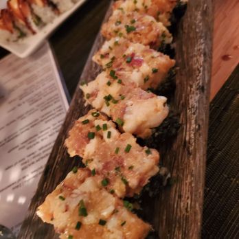 O-Ku - Black Magic. Black Squid Ink Rice with smashed Lobster on top - Sushi Bars Near Me - Nashville, Tennessee