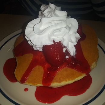 IHOP - Stack of buttermilk pancakes with strawberries and whipped cream. - Breakfast & Brunch Near Me - Chicago, Illinois