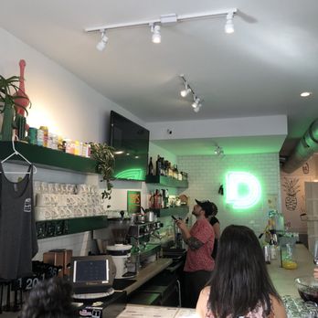 Daps Breakfast & Imbibe - Bar area with green hue lighting - Breakfast & Brunch Near Me - Charleston, South Carolina Daps Breakfast & Imbibe - Bar area with green hue lighting - Breakfast & Brunch Near Me - Charleston, South Carolina