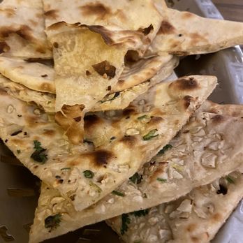 Gandhi 2 - Garlic and butter naan - Indian Near Me - Rome, RM Gandhi 2 - Garlic and butter naan - Indian Near Me - Rome, RM