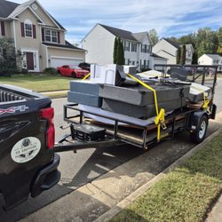 PD Services - Crew removing junk for a customer