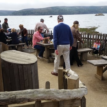 Hog Island Oyster - Part of the picnic area, a couple of stationary bbqs, and Tomales Bay. - Seafood Near Me - Marshall, California