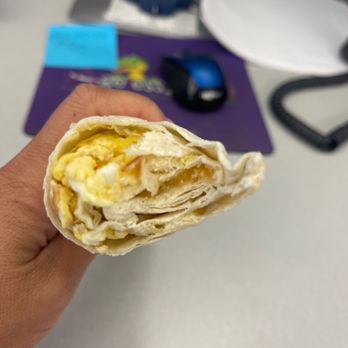 H kitchen - Supposed to be bacon, egg, potatoes breakfast burrito - Honduran Near Me - Fort Worth, Texas