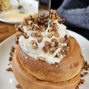 Cafe Flora - The cinnamon roll which they said was his biggest the plate and it wasn't, warm on the outside cold on the inside. A big turn off! - Vegetarian Near Me - Seattle, Washington Cafe Flora - The cinnamon roll which they said was his biggest the plate and it wasn't, warm on the outside cold on the inside. A big turn off! - Vegetarian Near Me - Seattle, Washington