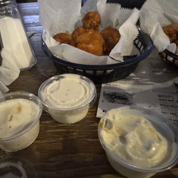 Lovell's Tavern - Traditional Bone-In 10 Wings With blue cheese and ranch - Pubs Near Me - Columbus, Ohio Lovell's Tavern - Traditional Bone-In 10 Wings With blue cheese and ranch - Pubs Near Me - Columbus, Ohio