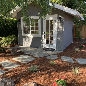 True Craft Builders - a garden shed with a stone walkway - General Contractors Near Me - Pacheco, California