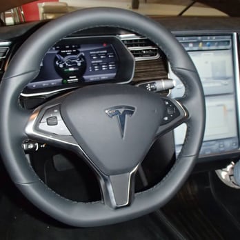 Tesla - Behind the wheel of the Tesla - Car Dealers Near Me - Miami Beach, Florida Tesla - Behind the wheel of the Tesla - Car Dealers Near Me - Miami Beach, Florida