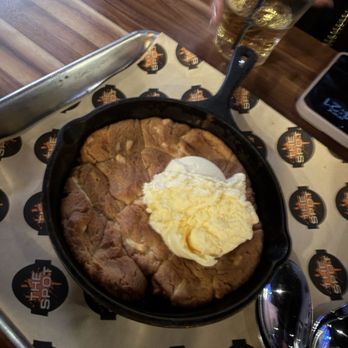 The Spot Lv - Pizookie (white chocolate macadamia cookie with vanilla ice cream) - Sports Bars Near Me - Las Vegas, Nevada The Spot Lv - Pizookie (white chocolate macadamia cookie with vanilla ice cream) - Sports Bars Near Me - Las Vegas, Nevada