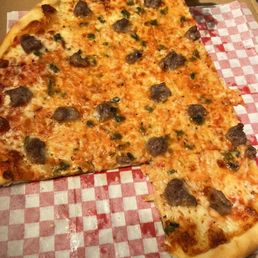 a half eaten pizza in a box