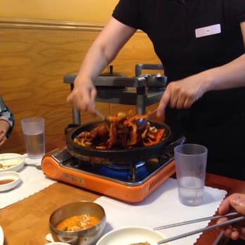 Pine Tree House - Stirring the pork and squid bulgogi - Korean Near Me - Sacramento, California