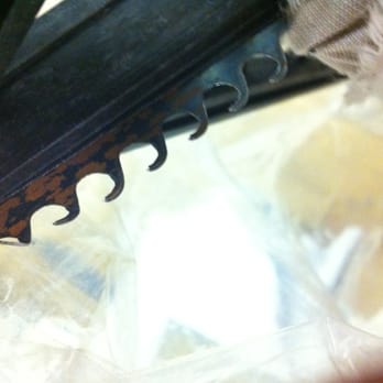 Textile Discount Outlet - This is the blade that cut my jeans. Why is this saw attached on a roll a fabric? - Fabric Stores Near Me - Chicago, Illinois