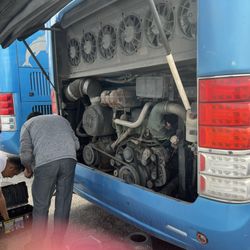 Tornado Bus - The poor bus driver trying to fix the bus.
