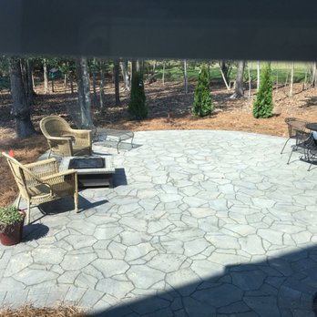 Evergreen  -  patio with chairs and a fire pit - Landscaping Near Me - Apex, North Carolina
