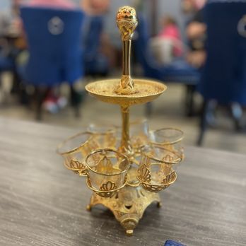 Gahwa Café - a three tiered cake stand with glasses on it - Coffee & Tea Near Me - Jacksonville, Florida Gahwa Café - a three tiered cake stand with glasses on it - Coffee & Tea Near Me - Jacksonville, Florida