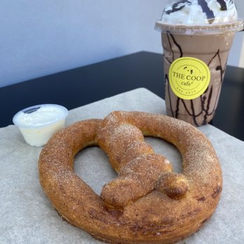Cluck Bucket - Downtown - Cinnamon sugar pretzel with cream cheese frosting and Kona mocha frappe - Pretzels Near Me - Ludington, Michigan Cluck Bucket - Downtown - Cinnamon sugar pretzel with cream cheese frosting and Kona mocha frappe - Pretzels Near Me - Ludington, Michigan