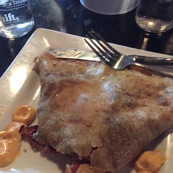 Rooster - Downtown - #3 Bacon Crepe. This has roasted tomatoes and goat cheese. I had jumped in before I remembered to take a picture. - Creperies Near Me - St. Louis, Missouri Rooster - Downtown - #3 Bacon Crepe. This has roasted tomatoes and goat cheese. I had jumped in before I remembered to take a picture. - Creperies Near Me - St. Louis, Missouri