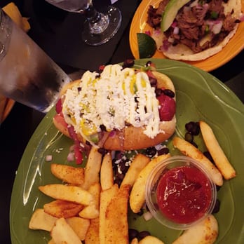 Barrio Queen - Sonoran hot dog wraoped in bacon and a carne asada taco - Mexican Near Me - Gilbert, Arizona Barrio Queen - Sonoran hot dog wraoped in bacon and a carne asada taco - Mexican Near Me - Gilbert, Arizona