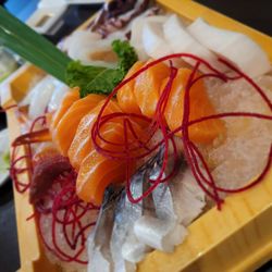 Torii Sushi - Salmon sashimi assortment still served chilled on ice