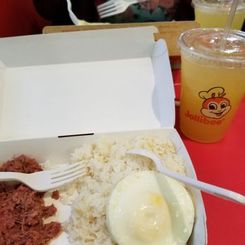 Jollibee - Corned beef breakfast with rice and egg. The drink is pineapple juice - Fast Food Near Me - Woodside, New York Jollibee - Corned beef breakfast with rice and egg. The drink is pineapple juice - Fast Food Near Me - Woodside, New York