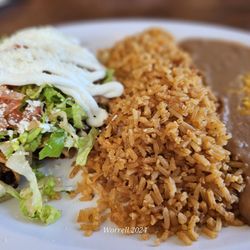 El Super Taco - Taquitos with black beans, mexican red rice and brown beans