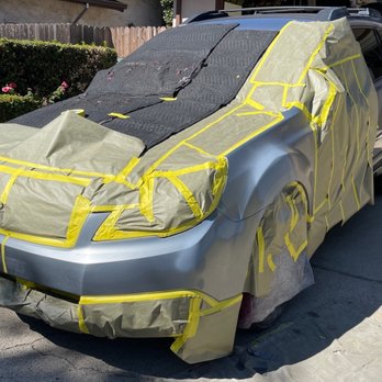 Colors On Parade - The car is taped and almost ready to paint - Mobile Dent Repair Near Me Colors On Parade - The car is taped and almost ready to paint - Mobile Dent Repair Near Me
