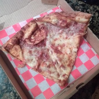 Carmella's Pizza Grill - Absolutely inedible.  Old pizza reheated - tasteless  and hard as a rock.  Avoid this place! - Pizza Near Me - Charlotte, North Carolina