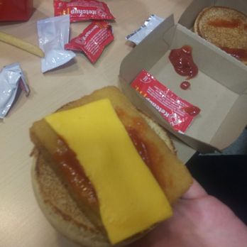 McDonald's - Poor lil fish filet just wanted a whole piece of cheese. - Fast Food Near Me - Grandy, North Carolina McDonald's - Poor lil fish filet just wanted a whole piece of cheese. - Fast Food Near Me - Grandy, North Carolina