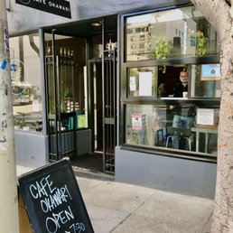 Exterior outside entrance of Cafe Okawari - Japanese styled casual sandwich and curry place with a inside seating and outdoors on a parklet. - San Francisco, California Exterior outside entrance of Cafe Okawari - Japanese styled casual sandwich and curry place with a inside seating and outdoors on a parklet. - San Francisco, California