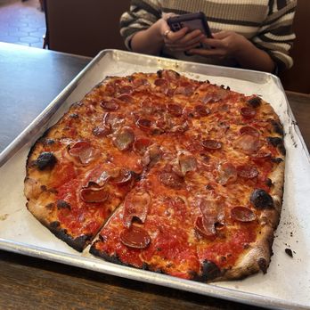 Sally's Apizza - Pepperoni and bacon pizza w/ red sauce - Pizza Near Me - New Haven, Connecticut Sally's Apizza - Pepperoni and bacon pizza w/ red sauce - Pizza Near Me - New Haven, Connecticut