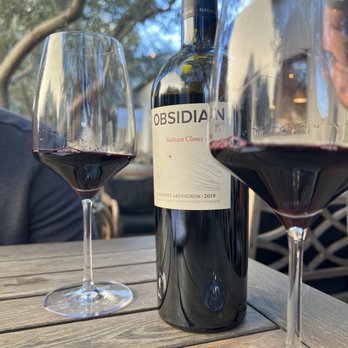 Obsidian Wine Co. - two glasses of wine on a table - Wine Tasting Room Near Me - Sonoma, California Obsidian Wine Co. - two glasses of wine on a table - Wine Tasting Room Near Me - Sonoma, California