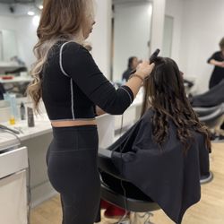 Paul Mammola Salon and Spa - This is the stylist Emily doing my hair.