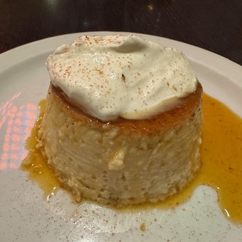 Jambo Cafe - Coconut cardamom flan. Lovely dessert. - Caribbean Near Me - Santa Fe, New Mexico