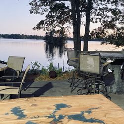 Blue Bayou Inn - Deck to enjoy your pre- or post-dinner cocktail on Spider Lake.