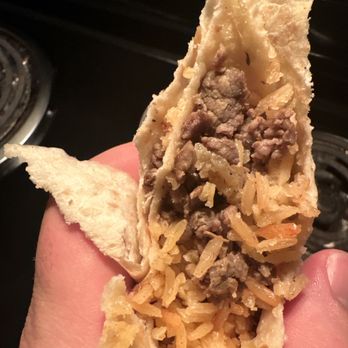 Don Rudy's - a hand holding a taco - Food Trucks Near Me - Kansas City, Kansas