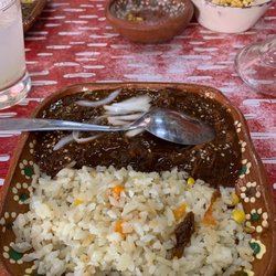 Los Famosos Equipales - Mole and rice. Free, if you spend more than $150 pesos
